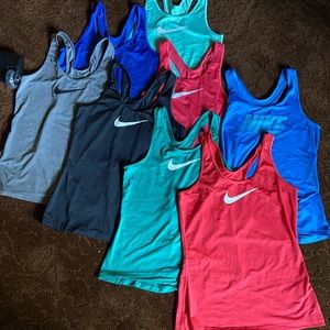 Nike dry fit tank tops! Size Medium… all gently used! All 8 tops!
